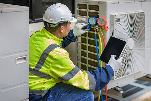 Professional Air Duct Cleaning technician working in Bartelso, IL